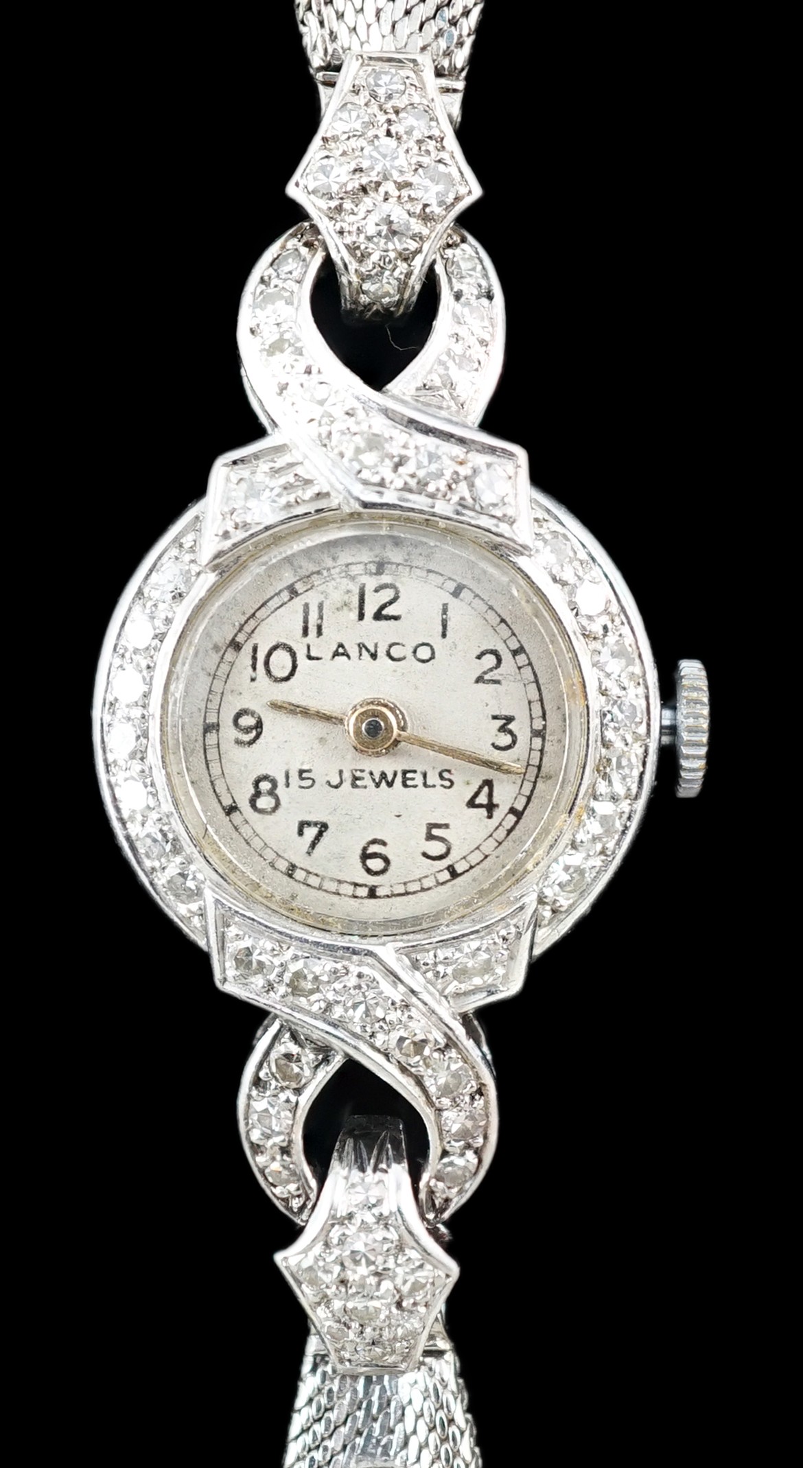 A lady's platinum and diamond set Lanco manual wind cocktail watch, on a 9ct gold and six stone diamond set bracelet